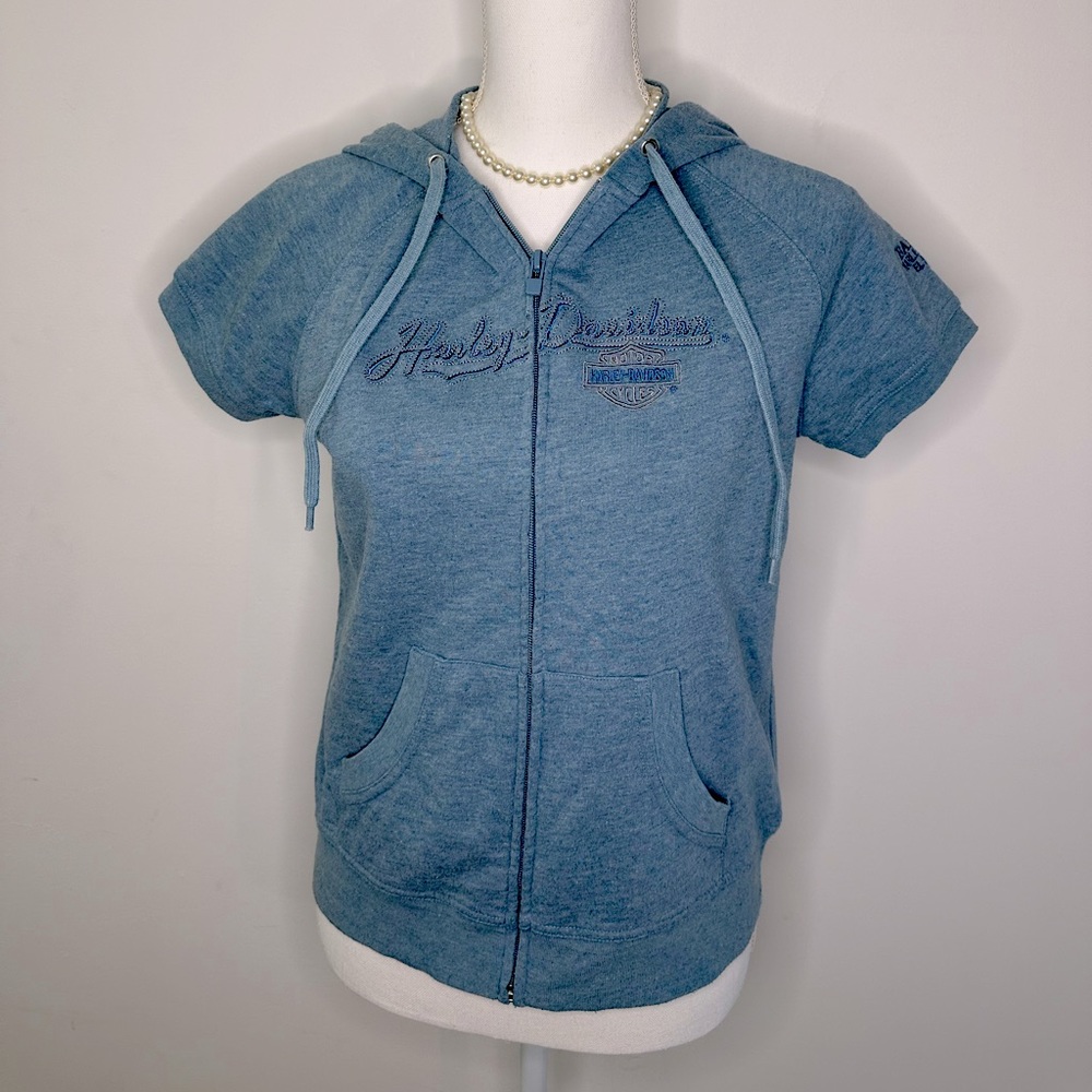 Harley Davidson women’s size Medium short sleeve zip up hooded shirt.
